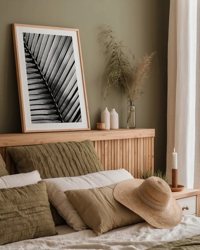 Palm Frond I by Debra Van Swearingen. shown as a paper print in a natural frame. Available as a archival giclee rolled canvas, fine art paper, or poster print. SKU 42488h.