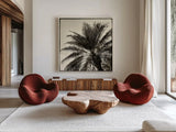 Palm Tree Sepia I by Debra Van Swearingen. Shown as extra-large giant wall art in a modern living room. Available as an archival giclee rolled canvas, fine art paper, or poster print. SKU 42499a.