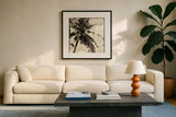 Palm Tree Sepia II by Debra Van Swearingen. Displayed in a glass frame with matte in a clean modern living room. Available as an archival giclee rolled canvas, fine art paper, or poster print. SKU 42500a.