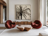 Palm Tree Sepia III by Debra Van Swearingen. Shown as extra-large giant wall art in a modern living room. Available as an archival giclee rolled canvas, fine art paper, or poster print. SKU 42501a.