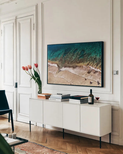 Sand and Sea by Debra Van Swearingen. shown as a framed stretched canvas in a living room above a console. Available as a archival giclee rolled canvas, fine art paper, or poster print. SKU 42504i.