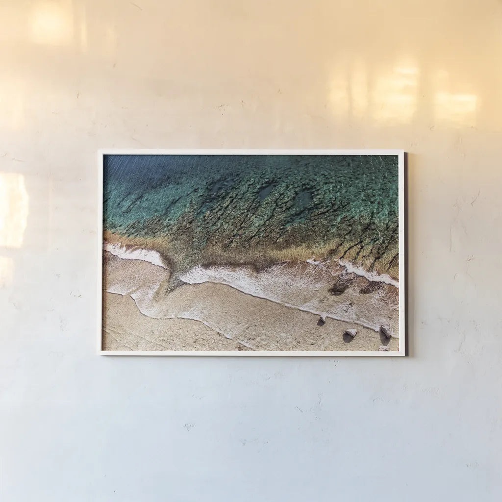 Sand and Sea by Debra Van Swearingen. shown as a paper print in a white frame. Available as a archival giclee rolled canvas, fine art paper, or poster print. SKU 42504i.