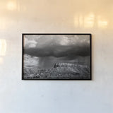 Storms on the Mesa by Debra Van Swearingen. shown as a paper print in a black flame. Available as a archival giclee rolled canvas, fine art paper, or poster print. SKU 19412i.