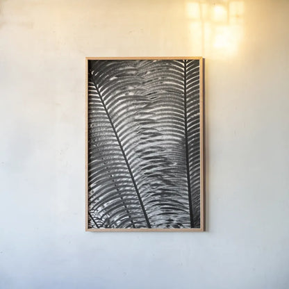 Sunlit Palms I by Debra Van Swearingen. shown as a paper print in a natural frame. Available as a archival giclee rolled canvas, fine art paper, or poster print. SKU 81257h.