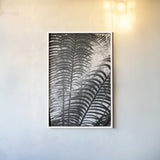 Sunlit Palms II by Debra Van Swearingen. shown as a paper print in a white frame. Available as a archival giclee rolled canvas, fine art paper, or poster print. SKU 81258h.
