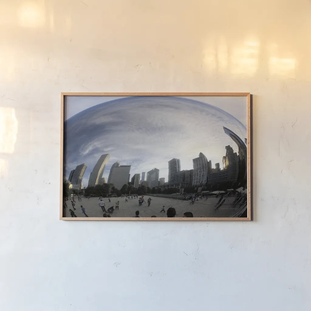 The Bean Chicago by Debra Van Swearingen. shown as a paper print in a natural frame. Available as a archival giclee rolled canvas, fine art paper, or poster print. SKU 55174i.