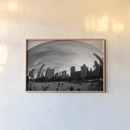 The Bean Chicago BW by Debra Van Swearingen. shown as a paper print in a natural frame. Available as a archival giclee rolled canvas, fine art paper, or poster print. SKU 55175i.