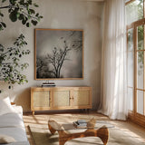 The Heron Rookery by Debra Van Swearingen. Shown in a natural wood frame in a cozy modern living room. Available as an archival giclee rolled canvas, fine art paper, or poster print. SKU 63818a.