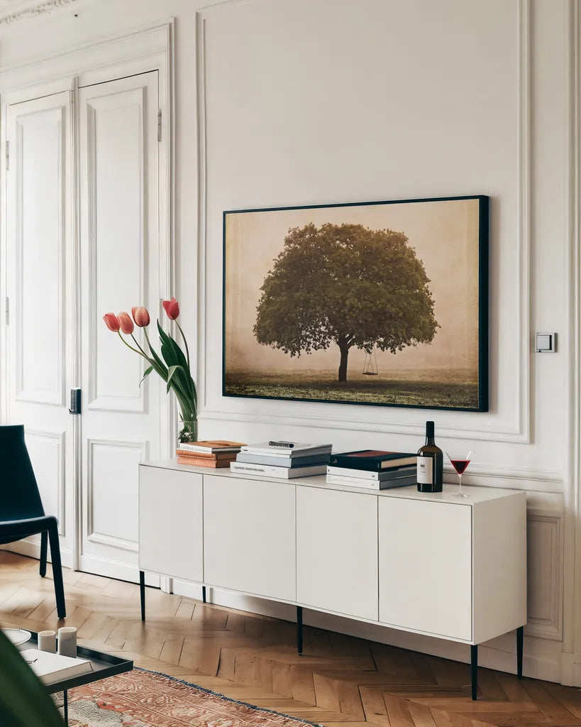The Hopeful Oak by Debra Van Swearingen. shown as a framed stretched canvas in a living room above a console. Available as a archival giclee rolled canvas, fine art paper, or poster print. SKU 45741i.