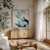 Translucent Tulips II Sq Aqua Crop by Debra Van Swearingen. Shown in a natural wood frame in a cozy modern living room. Available as an archival giclee rolled canvas, fine art paper, or poster print. SKU 28921a.