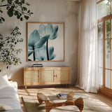 Translucent Tulips III Sq Aqua Crop by Debra Van Swearingen. Shown in a natural wood frame in a cozy modern living room. Available as an archival giclee rolled canvas, fine art paper, or poster print. SKU 28922a.
