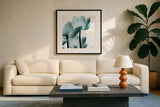Translucent Tulips III Sq Aqua Crop by Debra Van Swearingen. Displayed in a glass frame with matte in a clean modern living room. Available as an archival giclee rolled canvas, fine art paper, or poster print. SKU 28922a.