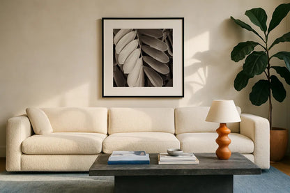 Tropical Plant I Crop by Debra Van Swearingen. Displayed in a glass frame with matte in a clean modern living room. Available as an archival giclee rolled canvas, fine art paper, or poster print. SKU 23499a.
