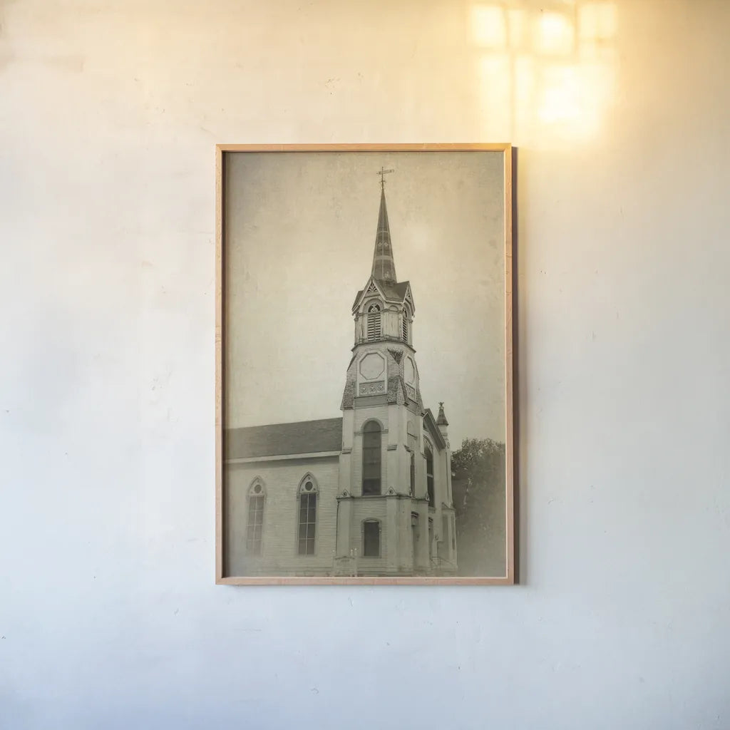 Wooden Steeple by Debra Van Swearingen. shown as a paper print in a natural frame. Available as a archival giclee rolled canvas, fine art paper, or poster print. SKU 88675h.