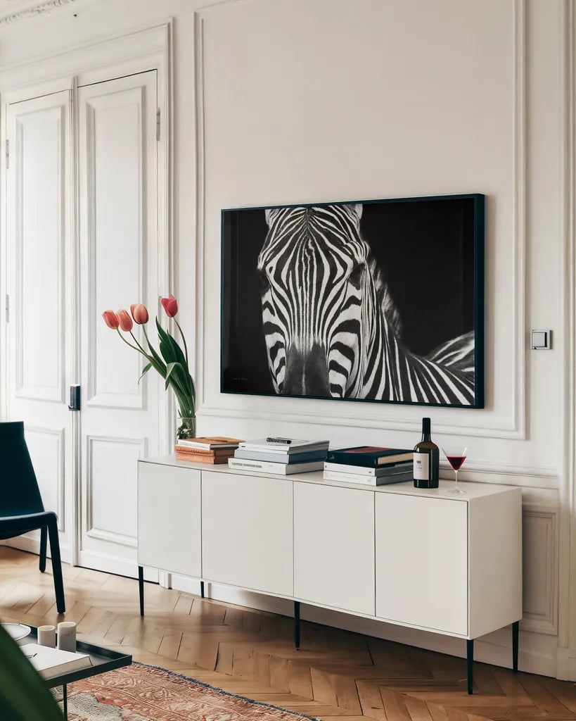 Zebra II Crop by Debra Van Swearingen. shown as a framed stretched canvas in a living room above a console. Available as a archival giclee rolled canvas, fine art paper, or poster print. SKU 16455i.