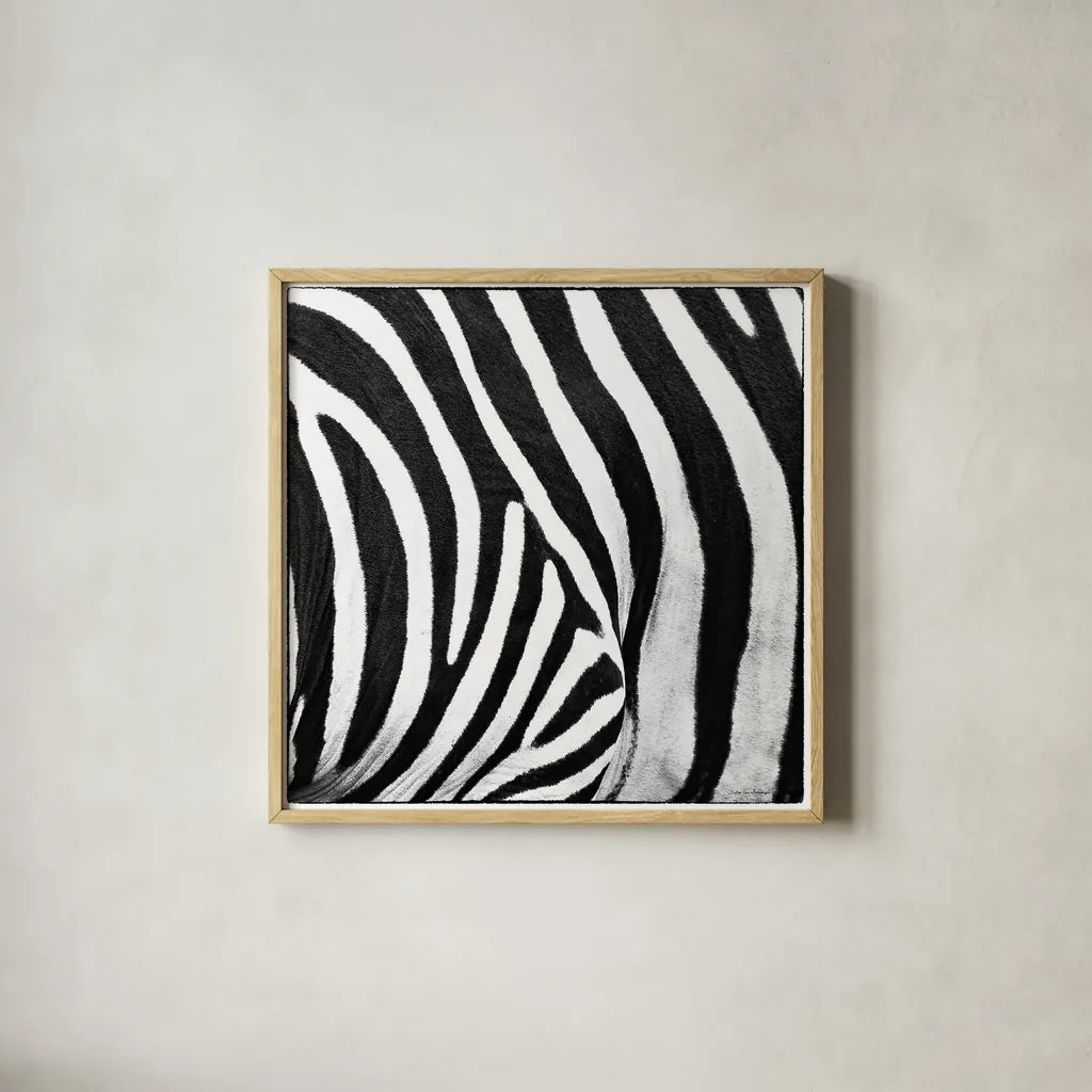 Zebra IV by Debra Van Swearingen. Shown in a natural wood glass frame for a timeless modern aesthetic. Available as an archival giclee rolled canvas, fine art paper, or poster print. SKU 48736a.