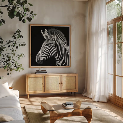 Zebra VII by Debra Van Swearingen. Shown in a natural wood frame in a cozy modern living room. Available as an archival giclee rolled canvas, fine art paper, or poster print. SKU 19455a.