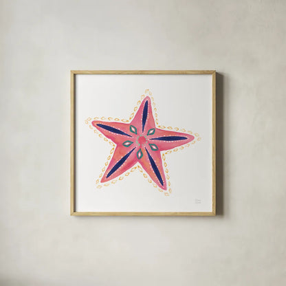 Along the Coast Starfish II by Dina June. Shown in a natural wood glass frame for a timeless modern aesthetic. Available as an archival giclee rolled canvas, fine art paper, or poster print. SKU 86007a.