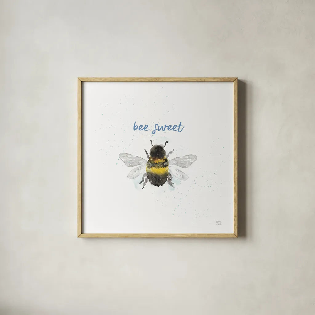 Bee Harmony VI White by Dina June. Shown in a natural wood glass frame for a timeless modern aesthetic. Available as an archival giclee rolled canvas, fine art paper, or poster print. SKU 66090a.