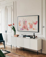 Classy Cocktails I by Dina June. shown as a framed stretched canvas in a living room above a console. Available as a archival giclee rolled canvas, fine art paper, or poster print. SKU 69234i.