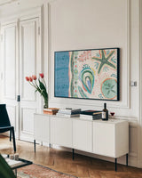 Coastline I by Dina June. shown as a framed stretched canvas in a living room above a console. Available as a archival giclee rolled canvas, fine art paper, or poster print. SKU 94495i.