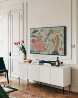 Floralscape Fairies I by Dina June. shown as a framed stretched canvas in a living room above a console. Available as a archival giclee rolled canvas, fine art paper, or poster print. SKU 88919i.