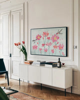 Flowers and Feathers I by Dina June. shown as a framed stretched canvas in a living room above a console. Available as a archival giclee rolled canvas, fine art paper, or poster print. SKU 62261i.