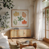 Harvest Whimsy V by Dina June. Shown in a natural wood frame in a cozy modern living room. Available as an archival giclee rolled canvas, fine art paper, or poster print. SKU 91924a.