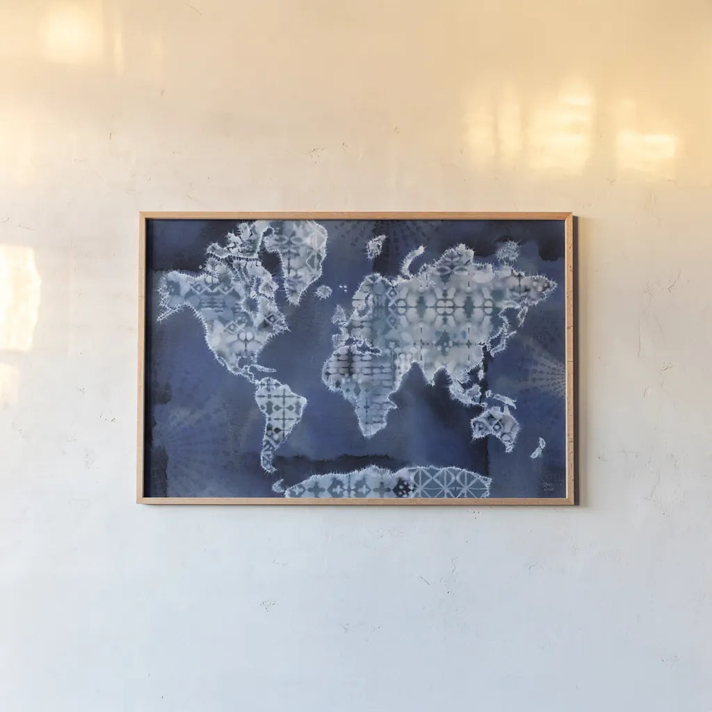 Indigo Splash I by Dina June. shown as a paper print in a natural frame. Available as a archival giclee rolled canvas, fine art paper, or poster print. SKU 71920i.