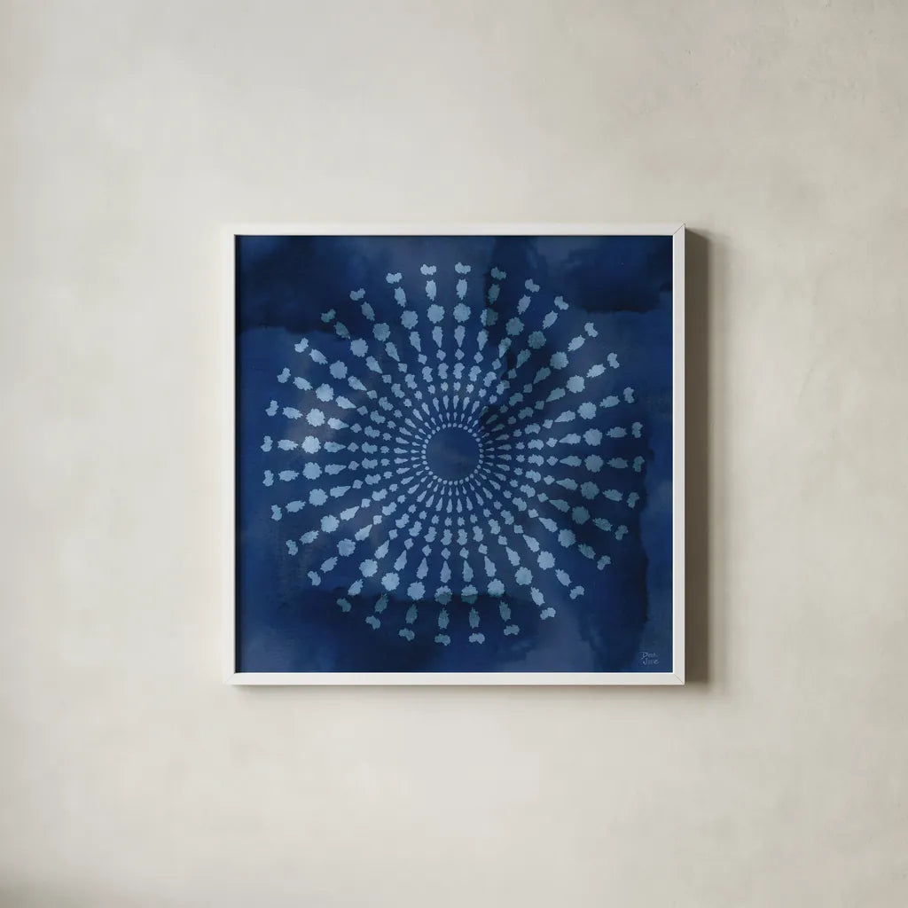 Indigo Splash V by Dina June. Shown in a crisp white glass frame for a clean and minimalist style. Available as an archival giclee rolled canvas, fine art paper, or poster print. SKU 71924a.