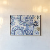 Indigo Splash VI by Dina June. shown as a paper print in a white frame. Available as a archival giclee rolled canvas, fine art paper, or poster print. SKU 71925i.
