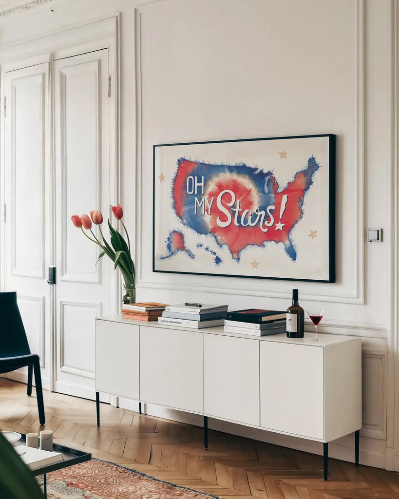 Oh My Stars I by Dina June. shown as a framed stretched canvas in a living room above a console. Available as a archival giclee rolled canvas, fine art paper, or poster print. SKU 73470i.