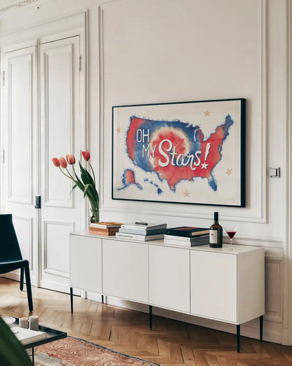 Oh My Stars I by Dina June. shown as a framed stretched canvas in a living room above a console. Available as a archival giclee rolled canvas, fine art paper, or poster print. SKU 73470i.