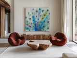 Peacock Glory V by Dina June. Shown as extra-large giant wall art in a modern living room. Available as an archival giclee rolled canvas, fine art paper, or poster print. SKU 65991a.