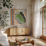 Rainforest II by Dina June. Shown in a natural wood frame in a cozy modern living room. Available as an archival giclee rolled canvas, fine art paper, or poster print. SKU 92493a.