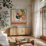 Rainforest IV by Dina June. Shown in a natural wood frame in a cozy modern living room. Available as an archival giclee rolled canvas, fine art paper, or poster print. SKU 92495a.