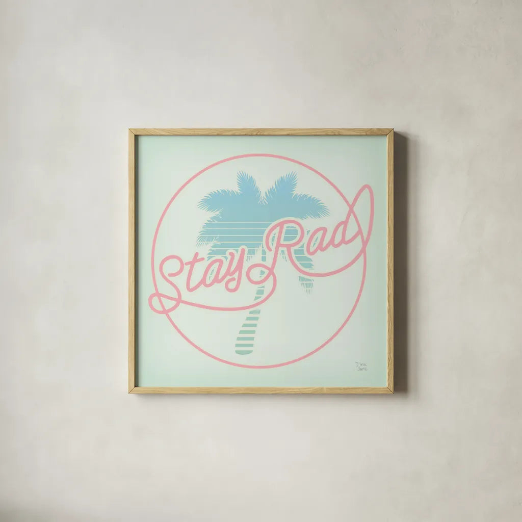 Stay Rad Palm I by Dina June. Shown in a natural wood glass frame for a timeless modern aesthetic. Available as an archival giclee rolled canvas, fine art paper, or poster print. SKU 64943a.