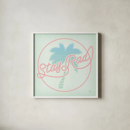 Stay Rad Palm I by Dina June. Shown in a crisp white glass frame for a clean and minimalist style. Available as an archival giclee rolled canvas, fine art paper, or poster print. SKU 64943a.