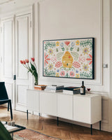 Wild Blooms I by Dina June. shown as a framed stretched canvas in a living room above a console. Available as a archival giclee rolled canvas, fine art paper, or poster print. SKU 90395i.