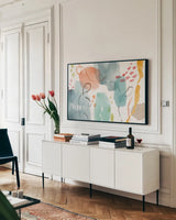 Winged Whisper VIII by Dina June. shown as a framed stretched canvas in a living room above a console. Available as a archival giclee rolled canvas, fine art paper, or poster print. SKU 72940i.