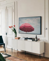 Beach Bliss I by Elizabeth Urquhart. shown as a framed stretched canvas in a living room above a console. Available as a archival giclee rolled canvas, fine art paper, or poster print. SKU 33204i.