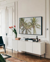 By the Sea II by Elizabeth Urquhart. shown as a framed stretched canvas in a living room above a console. Available as a archival giclee rolled canvas, fine art paper, or poster print. SKU 50750i.