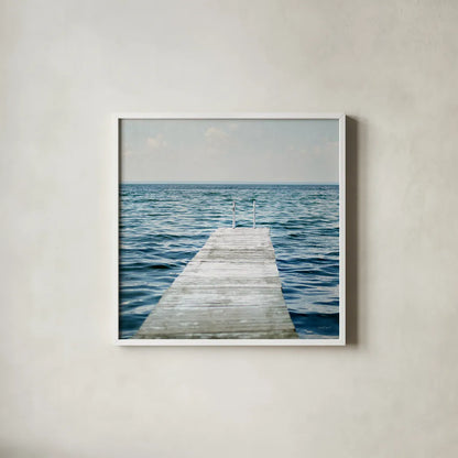Calm Days I Crop by Elizabeth Urquhart. Shown in a crisp white glass frame for a clean and minimalist style. Available as an archival giclee rolled canvas, fine art paper, or poster print. SKU 23795a.
