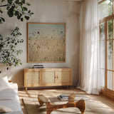 Falling Queen Annes Lace II Crop by Elizabeth Urquhart. Shown in a natural wood frame in a cozy modern living room. Available as an archival giclee rolled canvas, fine art paper, or poster print. SKU 30338a.
