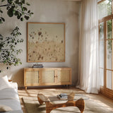 Falling Queen Annes Lace II Crop Sepia by Elizabeth Urquhart. Shown in a natural wood frame in a cozy modern living room. Available as an archival giclee rolled canvas, fine art paper, or poster print. SKU 54310a.
