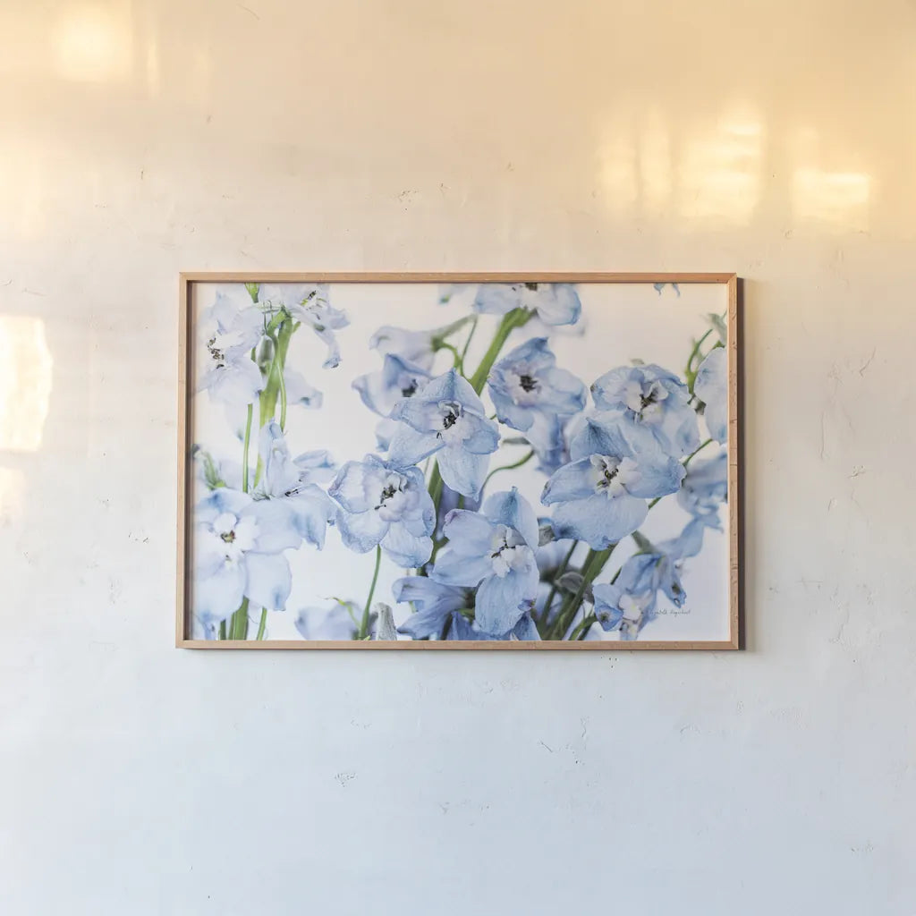 Freshly Picked Delphinium I by Elizabeth Urquhart. shown as a paper print in a natural frame. Available as a archival giclee rolled canvas, fine art paper, or poster print. SKU 67966i.