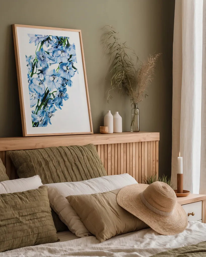 Freshly Picked Delphinium IV by Elizabeth Urquhart. shown as a paper print in a natural frame. Available as a archival giclee rolled canvas, fine art paper, or poster print. SKU 67969h.