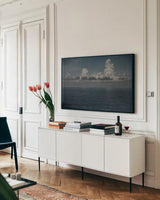 Into the Deep I by Elizabeth Urquhart. shown as a framed stretched canvas in a living room above a console. Available as a archival giclee rolled canvas, fine art paper, or poster print. SKU 50743i.