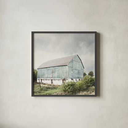 Late Summer Barn I Crop by Elizabeth Urquhart. Shown in a sleek black glass frame for a contemporary gallery look. Available as an archival giclee rolled canvas, fine art paper, or poster print. SKU 30333a.