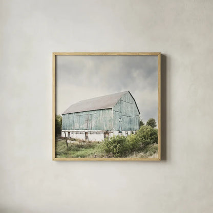 Late Summer Barn I Crop by Elizabeth Urquhart. Shown in a natural wood glass frame for a timeless modern aesthetic. Available as an archival giclee rolled canvas, fine art paper, or poster print. SKU 30333a.
